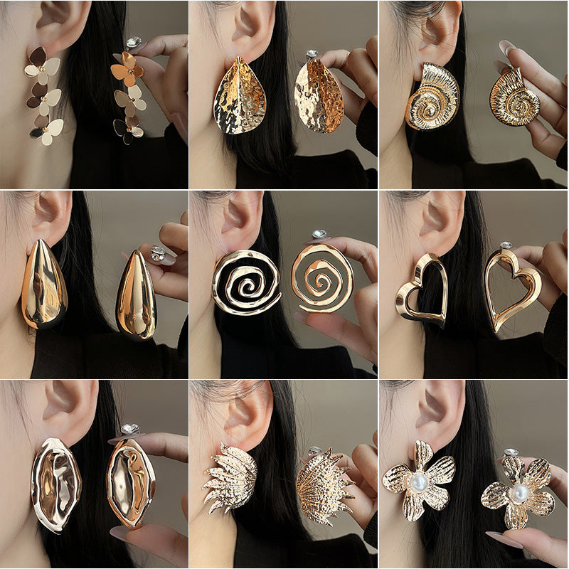 European and American light luxury high-end metal style simple personality earrings women's retro flower pearl hollow love earrings